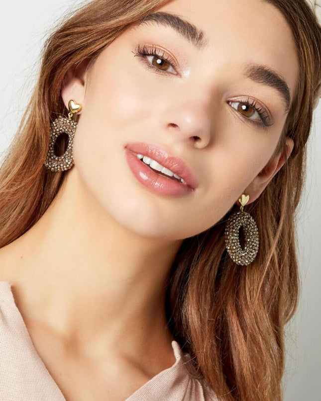 Oorbellen ovaal met kralen en hart detail wit