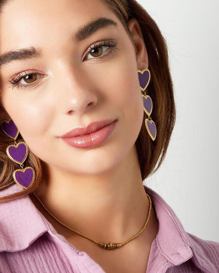 Statement oorbellen drie hartjes zwart & goud