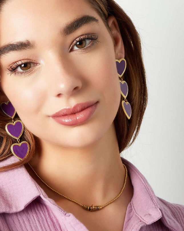 Statement oorbellen drie hartjes beige & goud