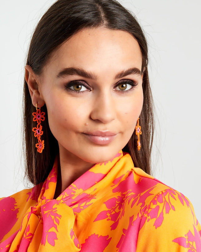 Oorbellen drie bloemen oranje, roze & lila