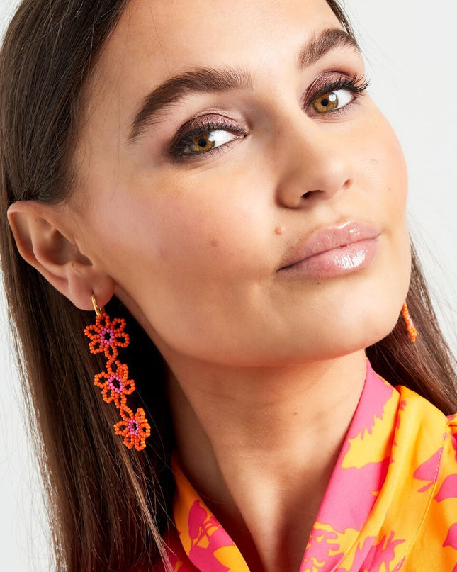 Oorbellen drie bloemen wit & goud