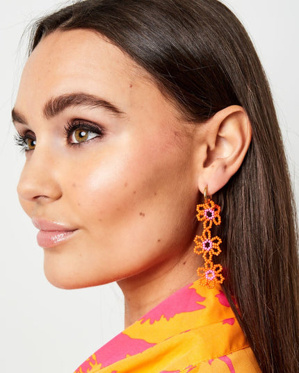 Oorbellen drie bloemen wit & goud