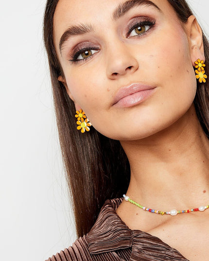 Bloemen oorbellen geel en oranje