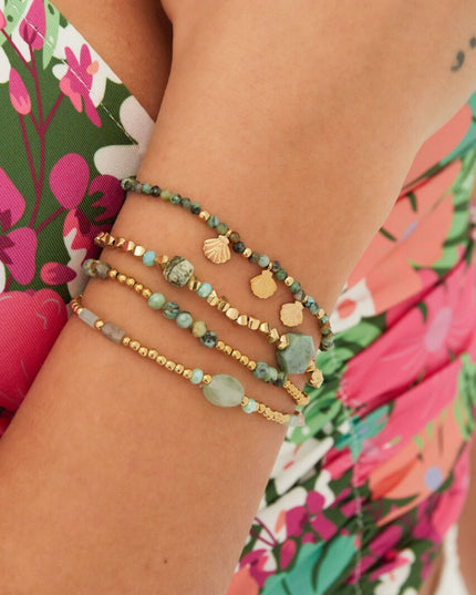 Kralenarmband schelpenbedels roze & goud