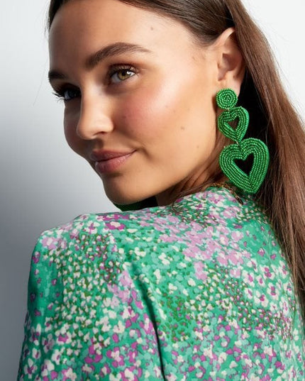 Dubbele hart oorbellen beige Glas