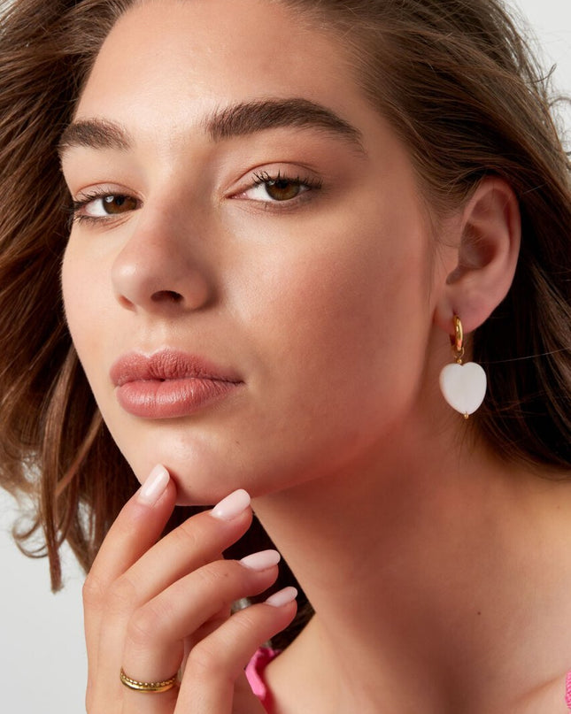 Oorbellen groot zeeschelp hart - Goud