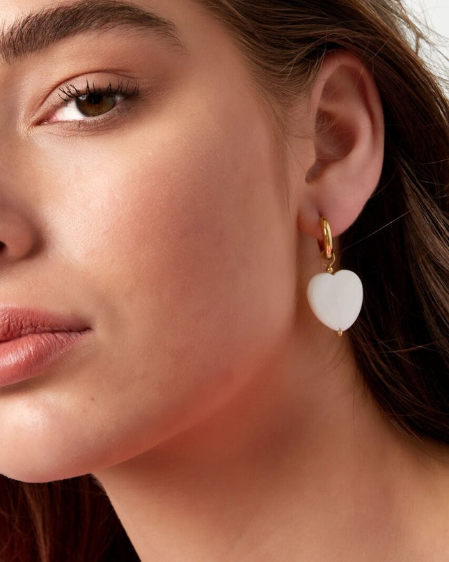 Oorbellen groot zeeschelp hart - Goud