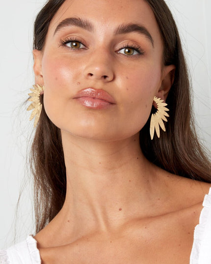 Statement oorbellen halve bloem - goud