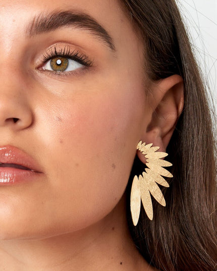 Statement oorbellen halve bloem - goud