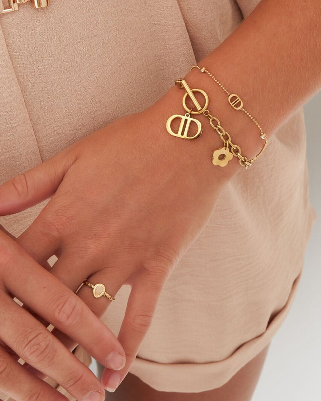 Armband logo's en steentjes - goud