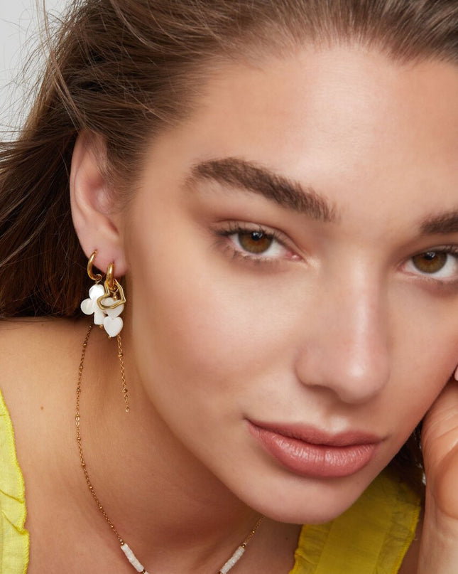 Oorbellen met hartjes hangers - Goud