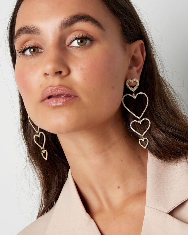 Oorbellen hartjes slinger - Goud