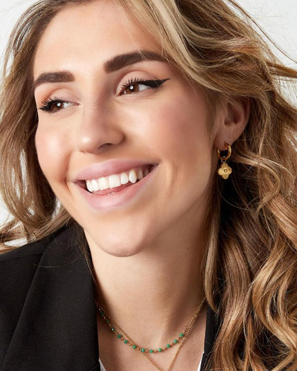 Oorbellen met hartjesbloem Zilver