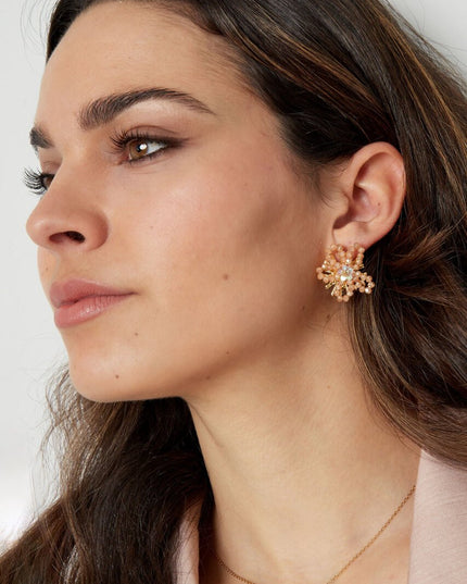 Kralen bloem oorbellen - lichtblauw