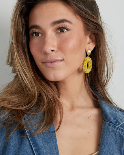 Ovale discodip oorbel - Fuchsia goud