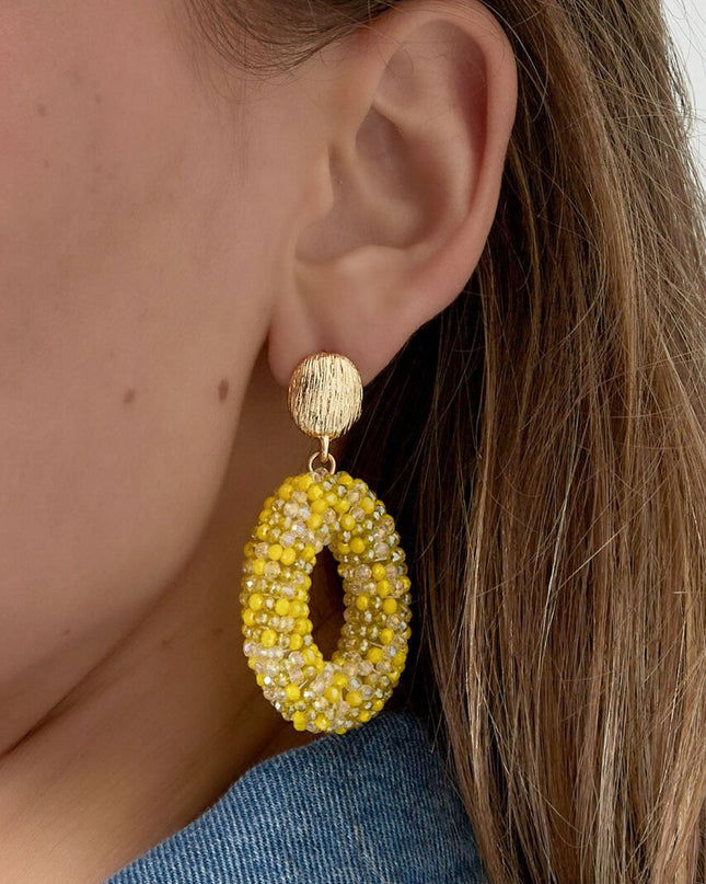 Ovale discodip oorbel - Fuchsia goud