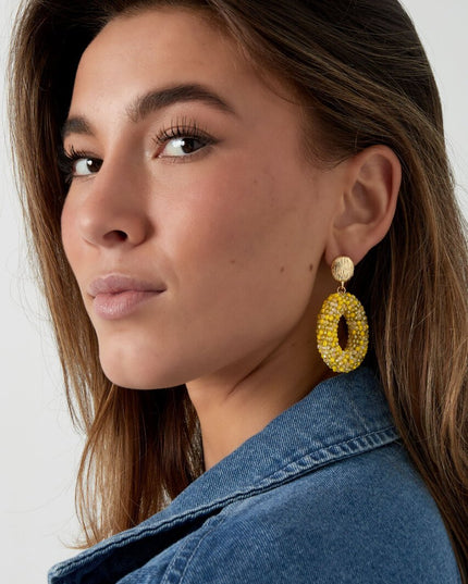 Ovale discodip oorbel - oranje goud