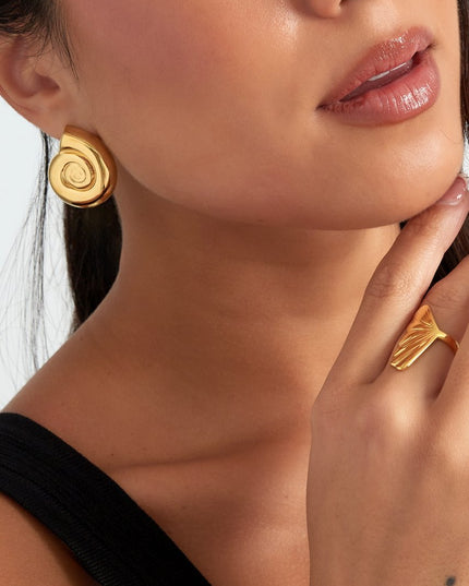 Oorbellen swirly shell - goud