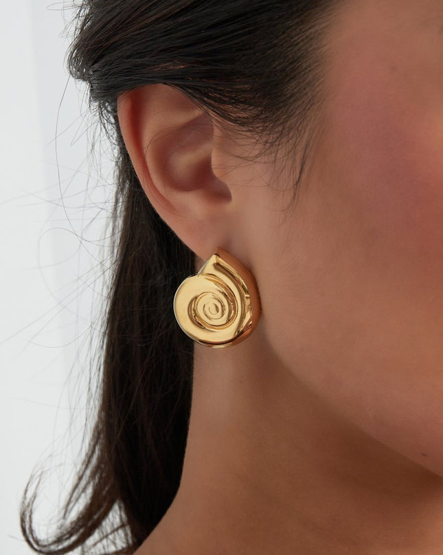 Oorbellen swirly shell - goud