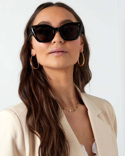 Zonnebril cat eye bruin met print