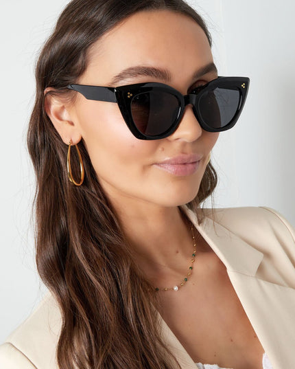 Zonnebril cat eye bruin met print