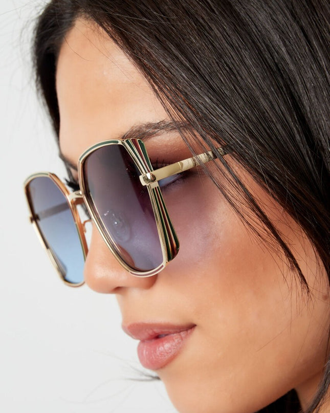 Zonnebril Ovale Glazen goud met zwart detail