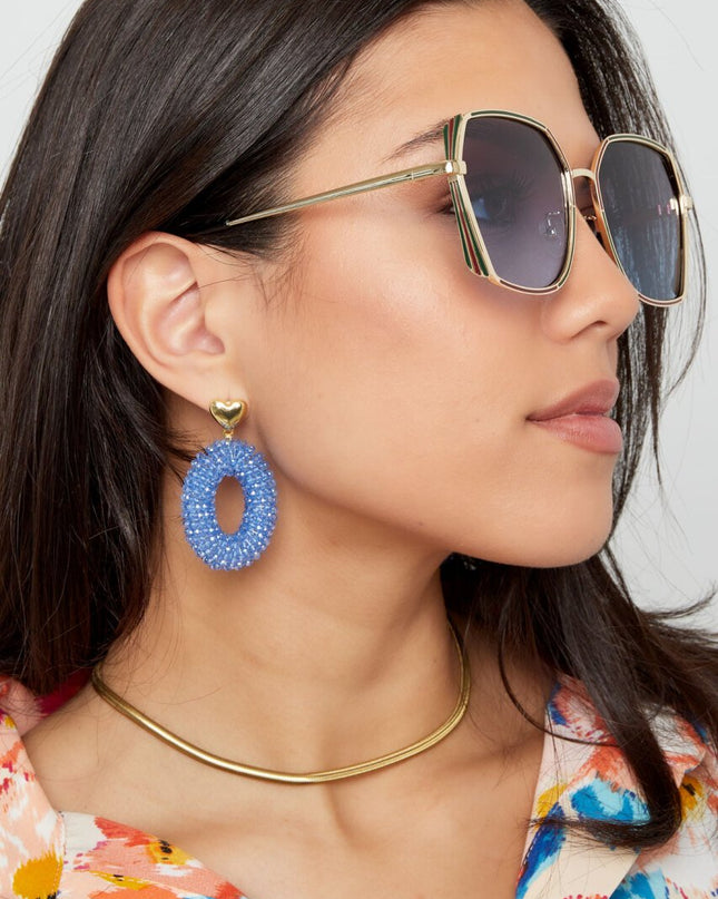 Zonnebril Ovale Glazen goud met zwart detail