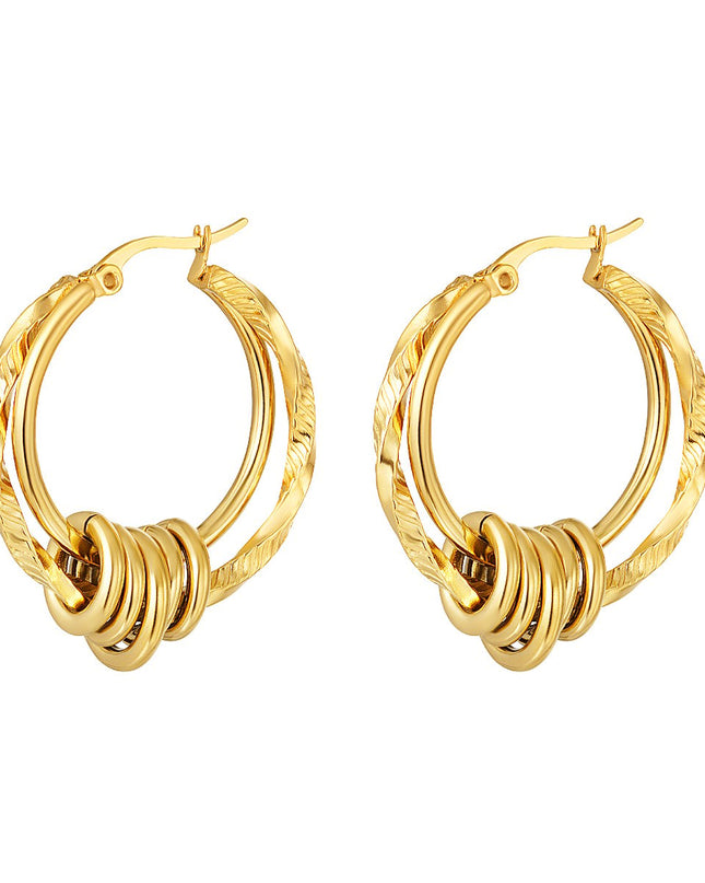 Dubbele gedraaide oorbel goud