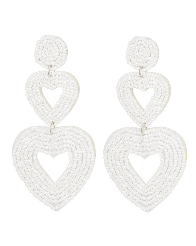 Dubbele hart oorbellen wit Glas