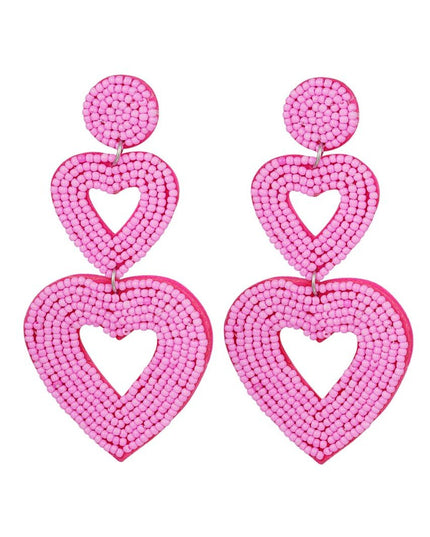 Dubbele hart oorbellen fuchsia Glas