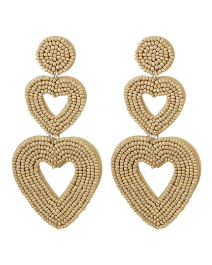 Dubbele hart oorbellen beige Glas