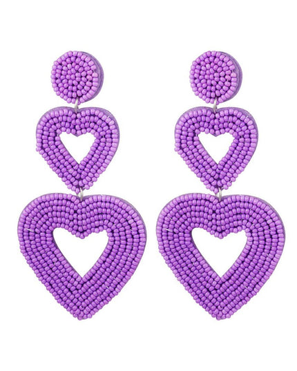 Dubbele hart oorbellen paars Glas