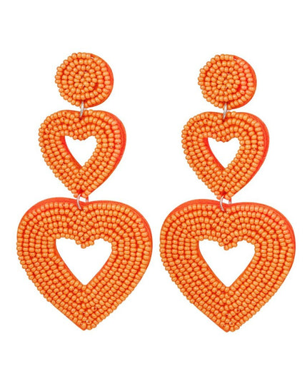 Dubbele hart oorbellen oranje Glas