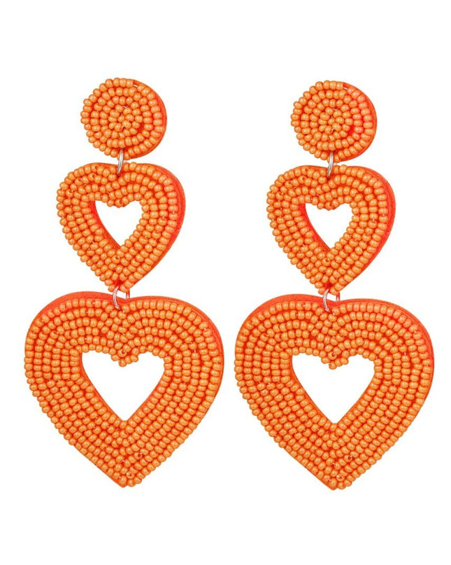 Dubbele hart oorbellen oranje Glas