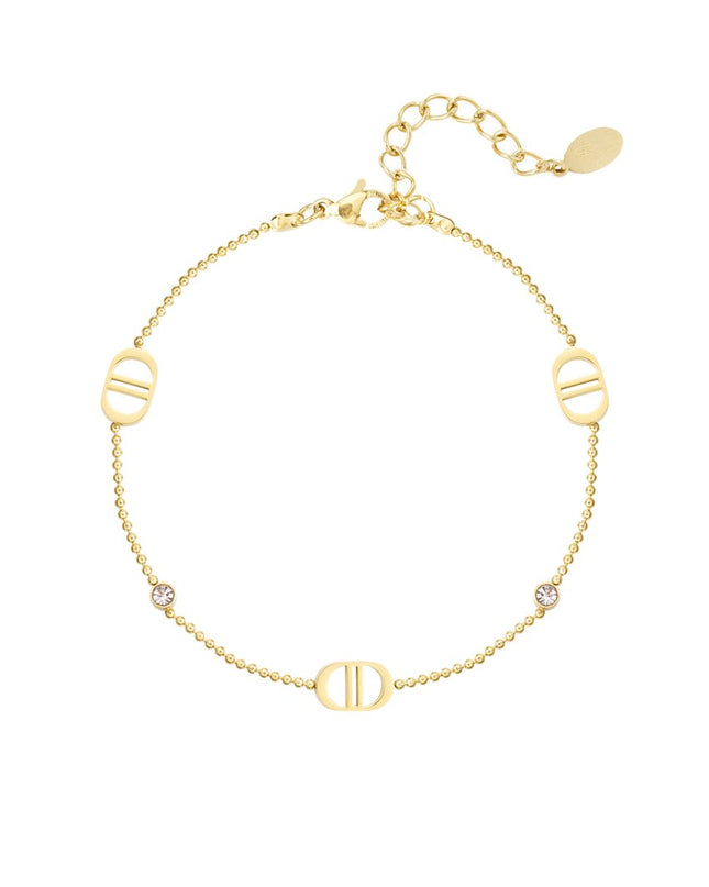 Armband logo's en steentjes - goud