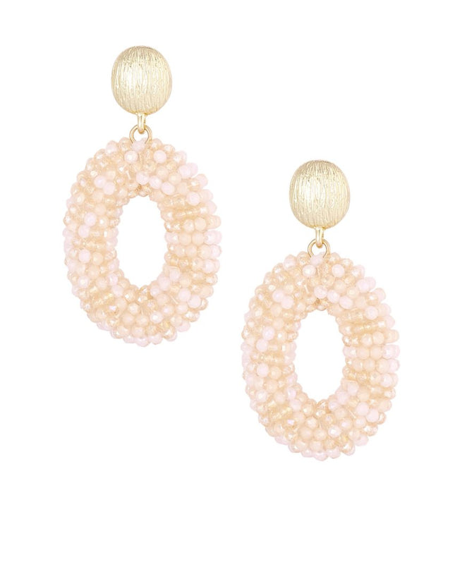 Ovale discodip oorbel - beige goud