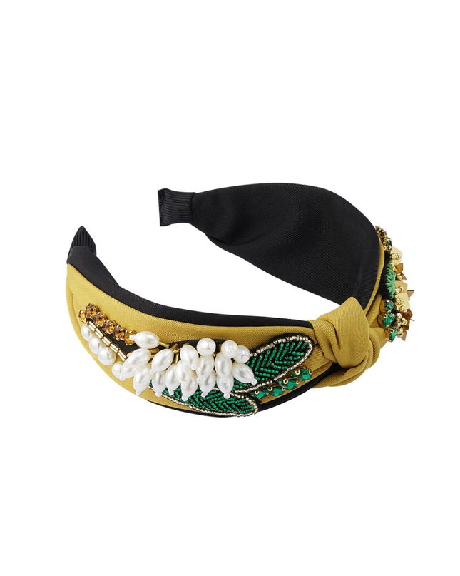 Haarband knoop en kralen Mosterd