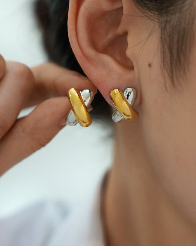 Twee kleurige oorbellen goud en zilver