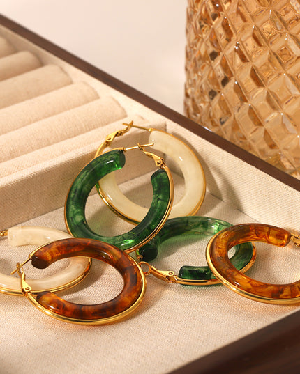 Oorbellen ringen groen goud