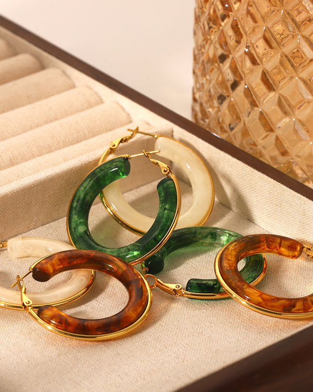 Oorbellen ringen bruin goud