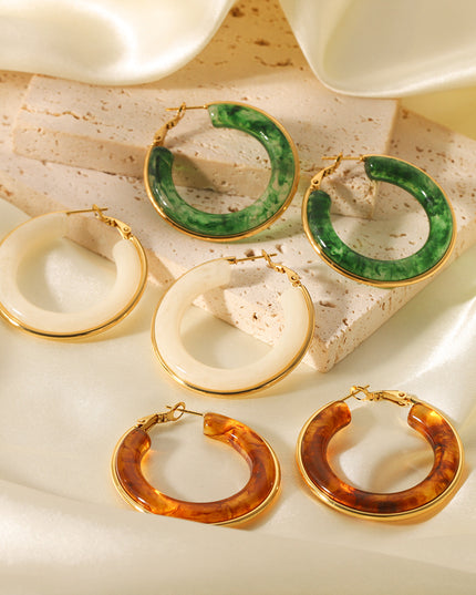 Oorbellen ringen groen goud