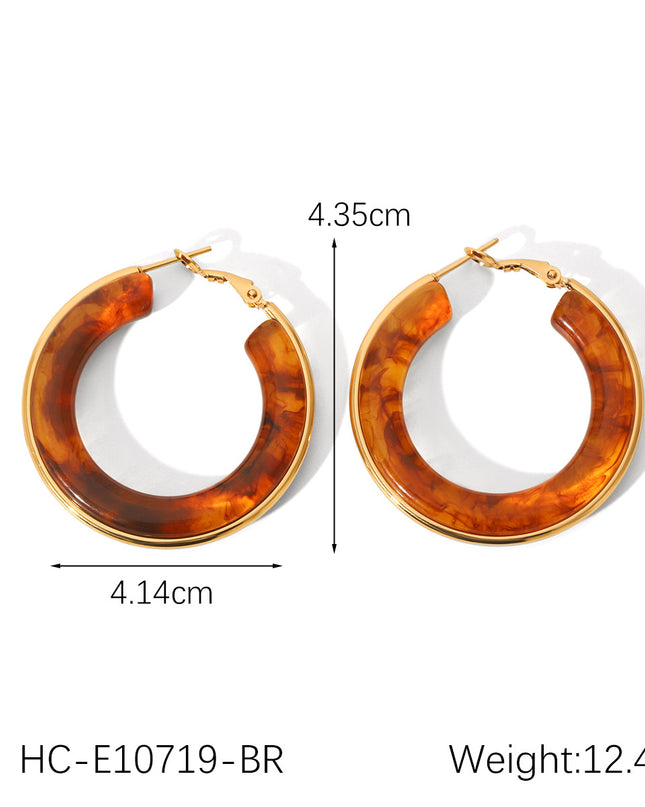 Oorbellen ringen bruin goud