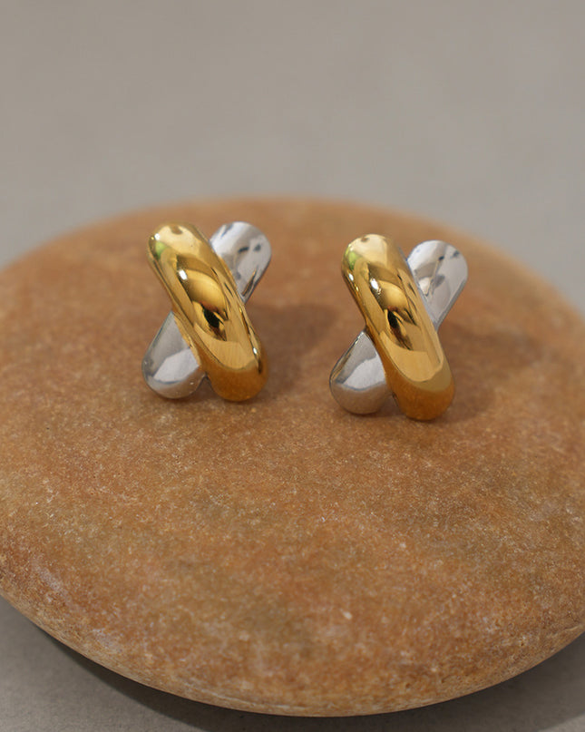 Twee kleurige oorbellen goud en zilver