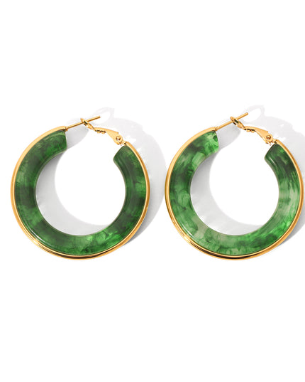 Oorbellen ringen groen goud